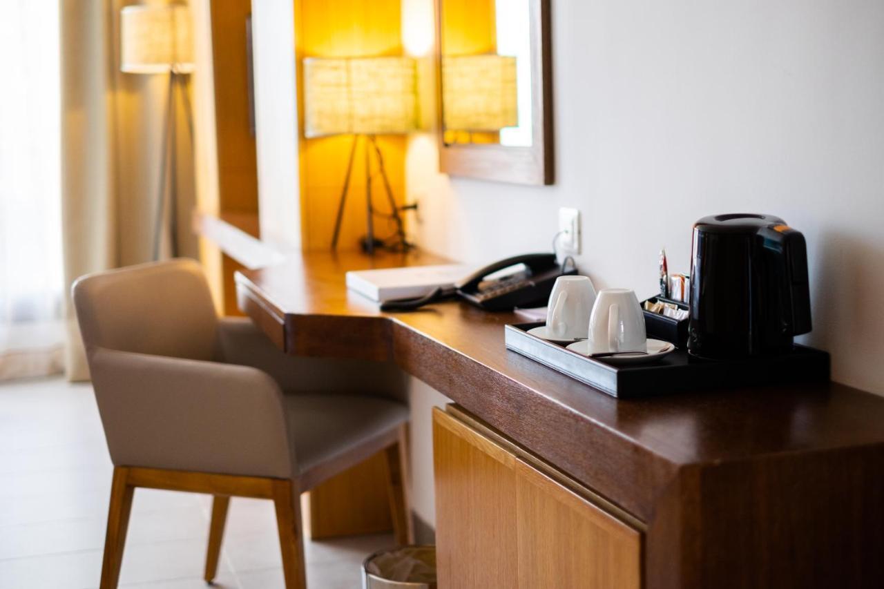 האממט Les Orangers Garden Villas And Bungalows Ultra All Inclusive מראה חיצוני תמונה A Nespresso machine in a hotel room